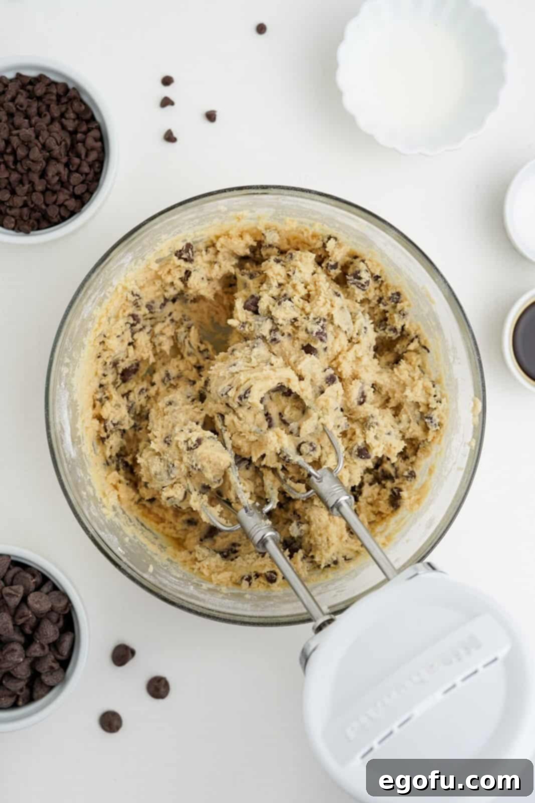 Choc-Chip Dough Delight 8 Chocolate chips fully mixed into the edible cookie dough batter, creating a uniform, delicious mixture.