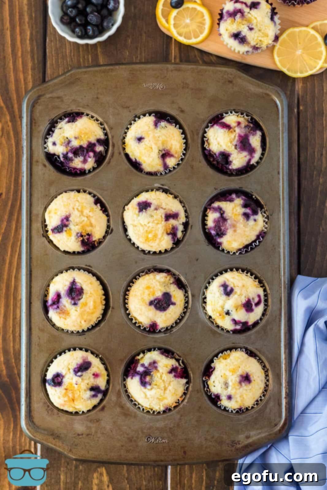 Finished muffins in muffin tin out of oven.