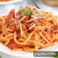 Our School's Spaghetti Day 14 Close up square image of a plate of the School Cafeteria Spaghetti.