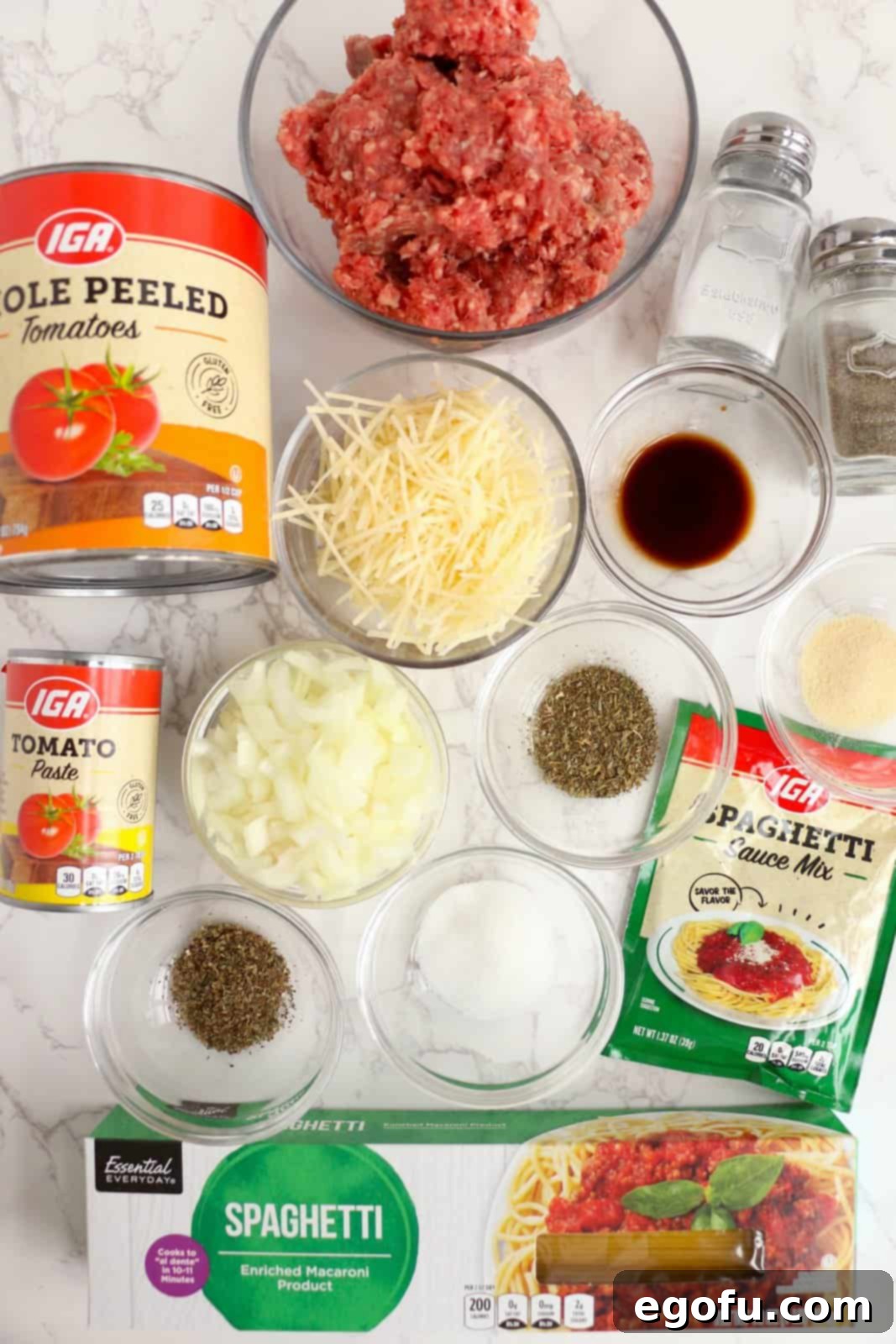 Our School's Spaghetti Day 4 Ingredients needed: ground beef, onions, dry spaghetti sauce mix, whole tomatoes, tomato paste, granulated sugar, worcestershire sauce, Italian seasoning, basil, garlic powder, salt, pepper, spaghetti and parmesan cheese.