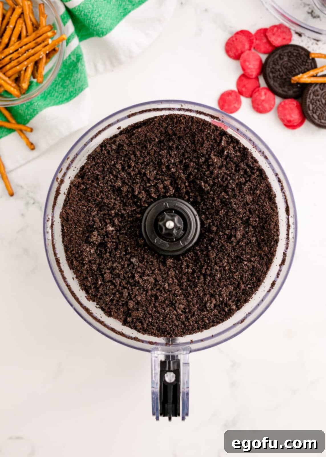 Finely crushed Oreos in a food processor, ready to be mixed into the truffle base for smooth and delicious results.