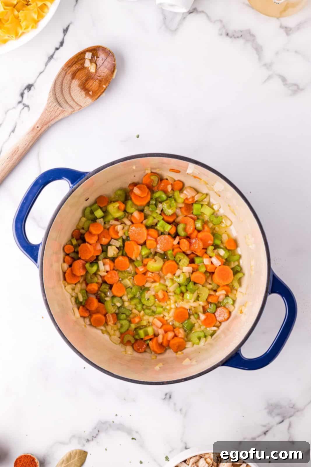 Vegetables and butter sautéed in dutch oven.