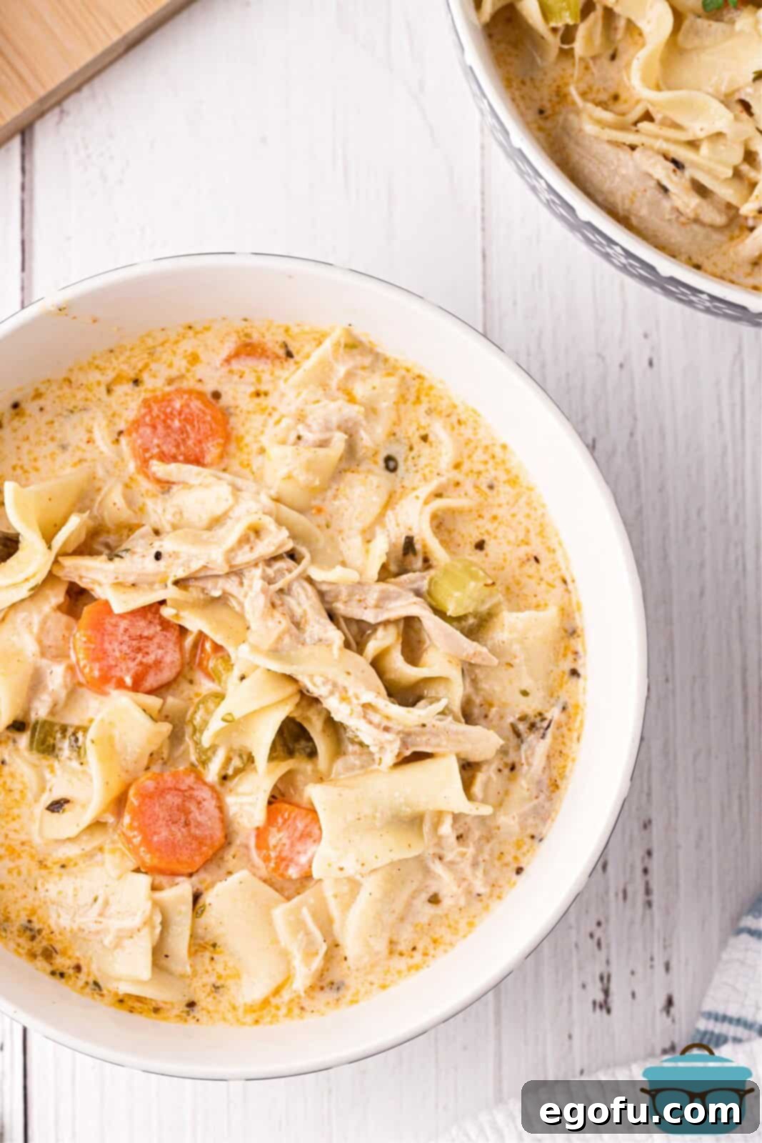 Overhead of one bowl of finished Creamy Chicken Noodle Soup.