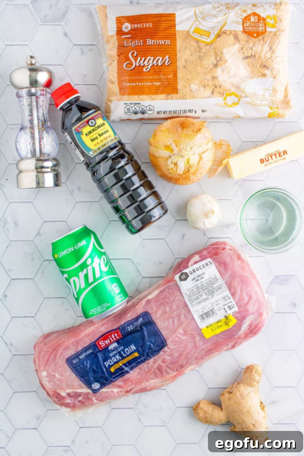 Effortless Crock Pot Pork Loin 4 Ingredients needed: pork loin roast, unsalted butter, onion, garlic, minced ginger, light brown sugar, lemon-lime soda, white vinegar, soy sauce, pepper, cornstarch, cold water and parsley for garnish.