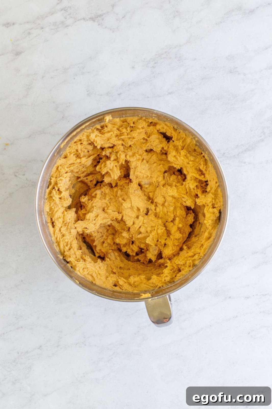Peanut Butter Oat Cookie Bliss 12 Cookie dough mixed together in bowl of stand mixer.