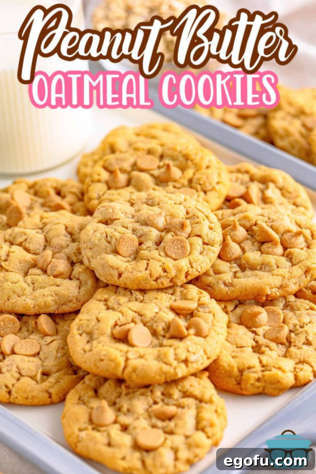 Peanut Butter Oat Cookie Bliss 3 Pinterest image of Peanut Butter Oatmeal Cookies layered on baking sheet.
