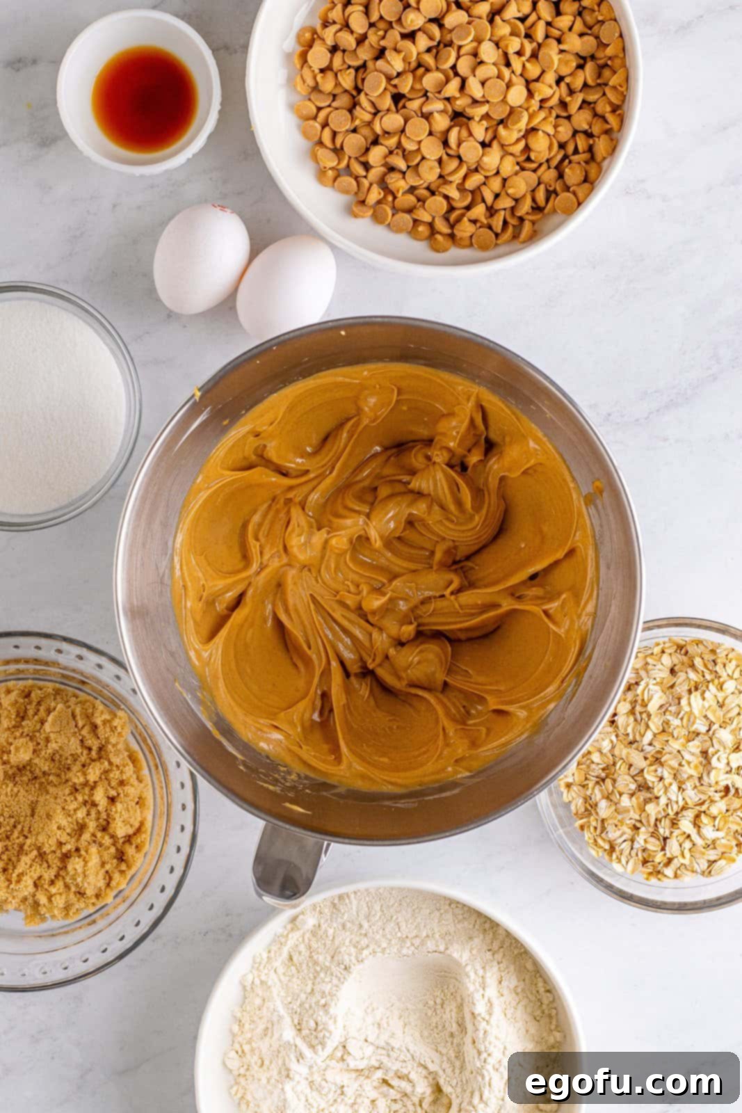 Peanut Butter Oat Cookie Bliss 6 Butter and peanut butter mixed together in bowl of stand mixer.