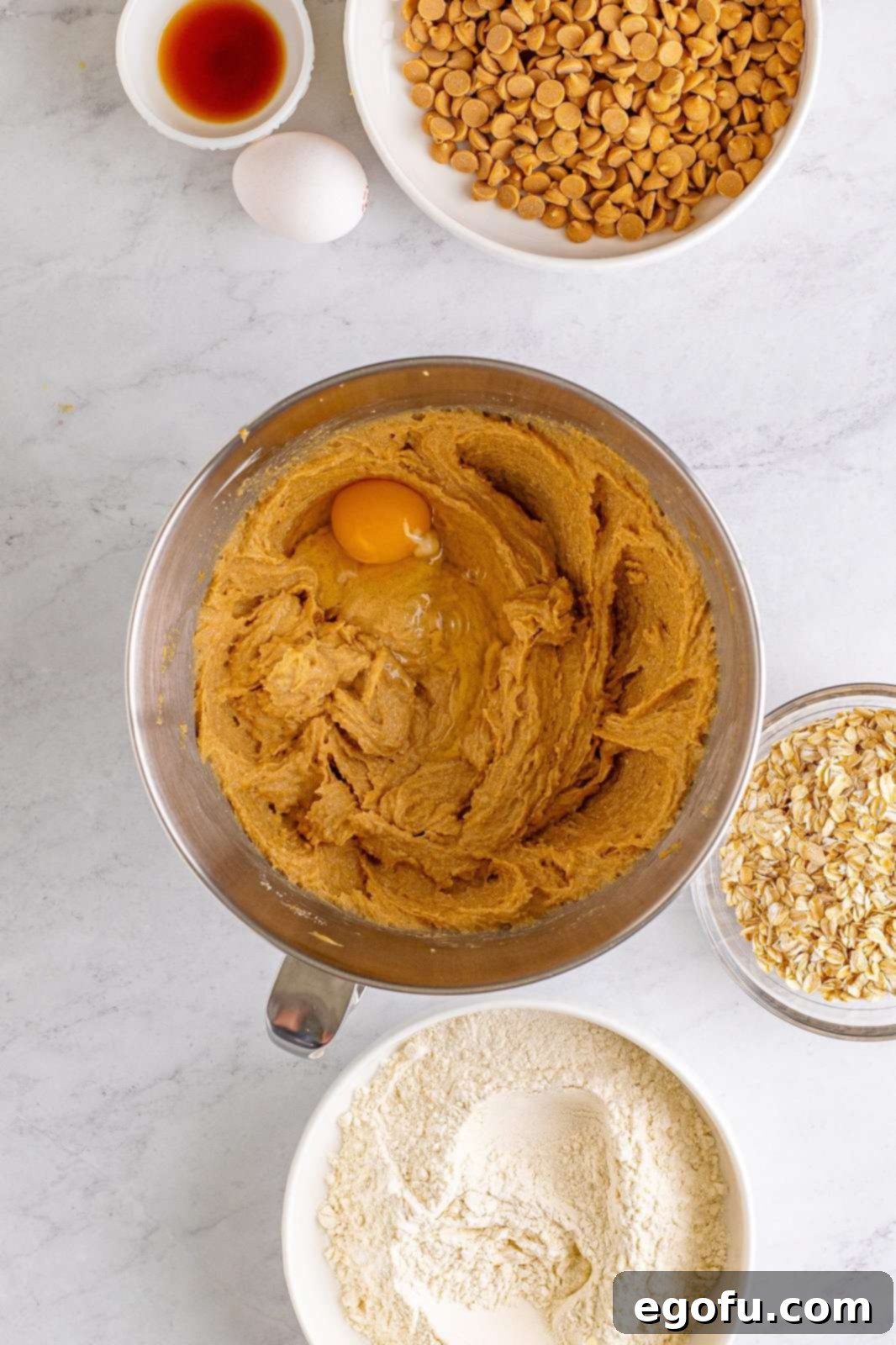 Peanut Butter Oat Cookie Bliss 9 Egg and vanilla added to bowl of stand mixer.