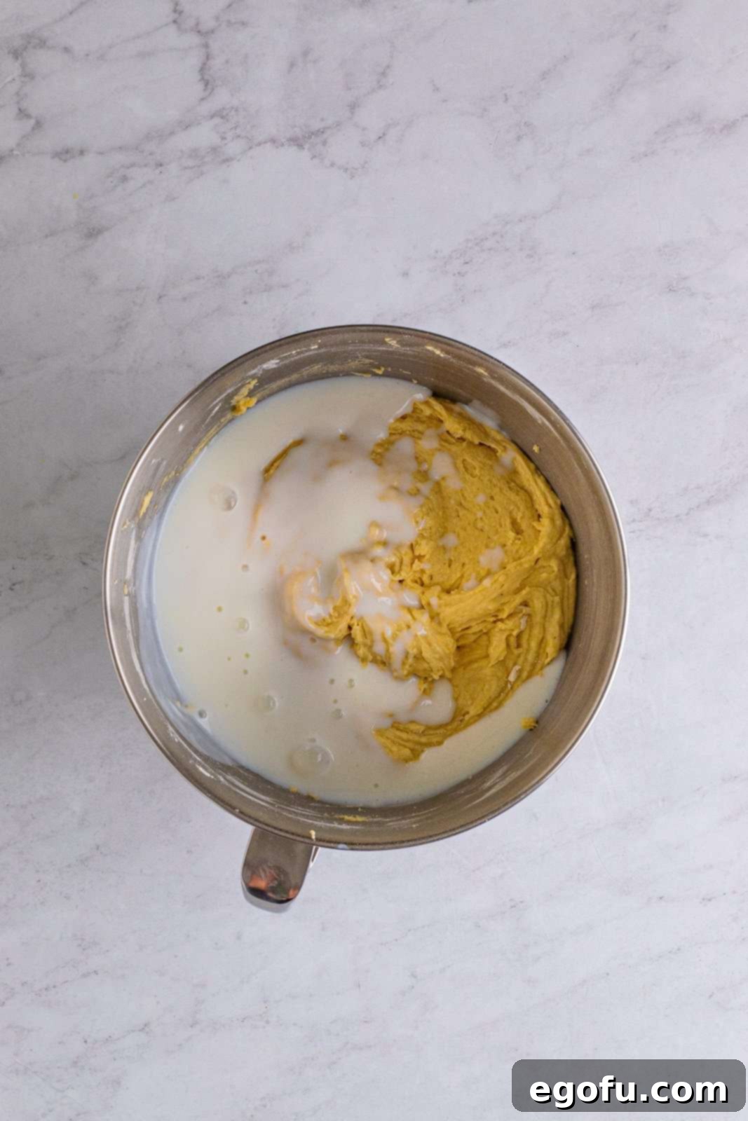 Golden Southern Caramel Delight 11 Milk added to bowl of stand mixer.