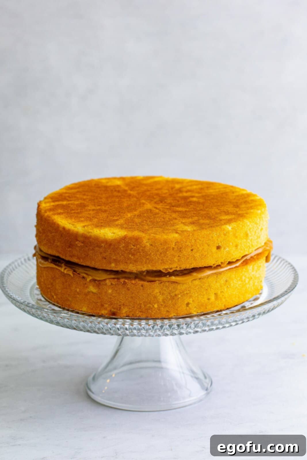 Golden Southern Caramel Delight 19 Second cake layer added to top of frosting.