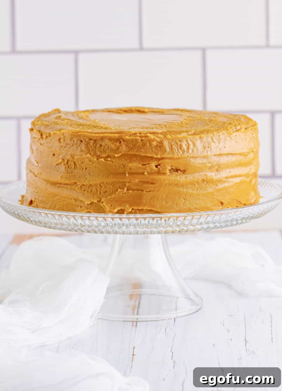 Golden Southern Caramel Delight 20 Finished frosted Southern Caramel Cake on cake server.