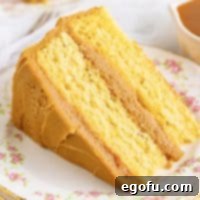 Golden Southern Caramel Delight 22 Close up square image of Southern Caramel Cake on flower plate.