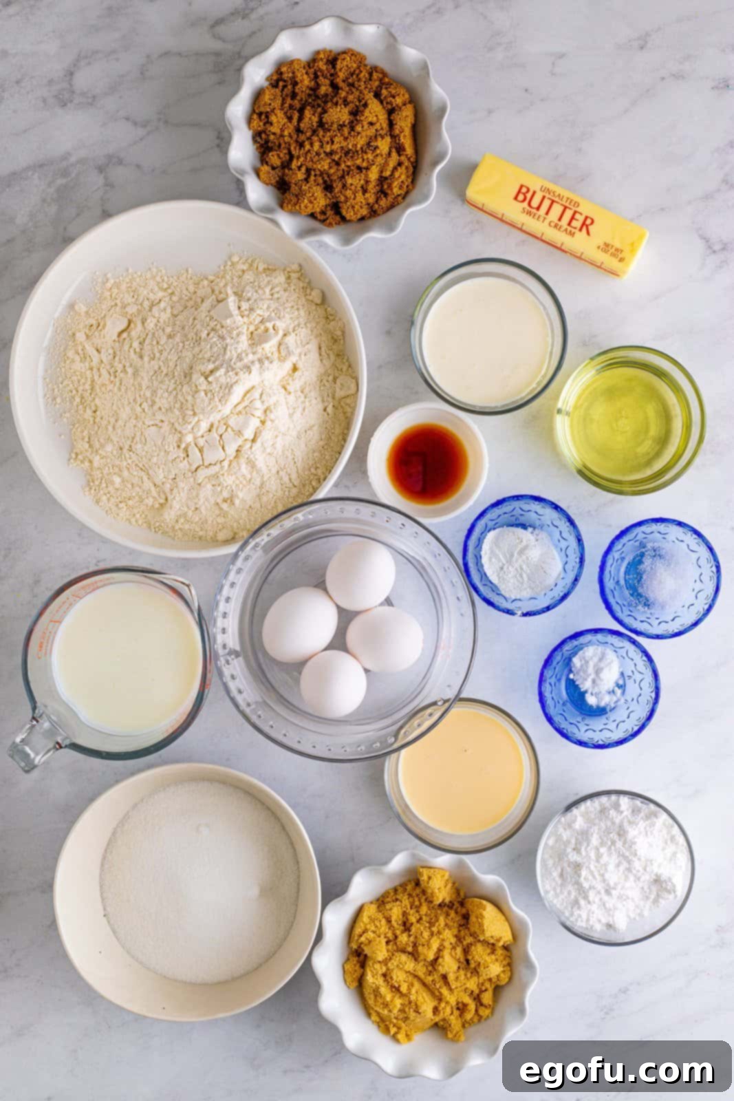 Golden Southern Caramel Delight 5 Ingredients needed: all-purpose flour, baking powder, baking soda, salt, unsalted butter, vegetable oil, granulated sugar, light brown sugar, eggs, vanilla extract, buttermilk, dark brown sugar, evaporated milk, heavy cream and powdered sugar.