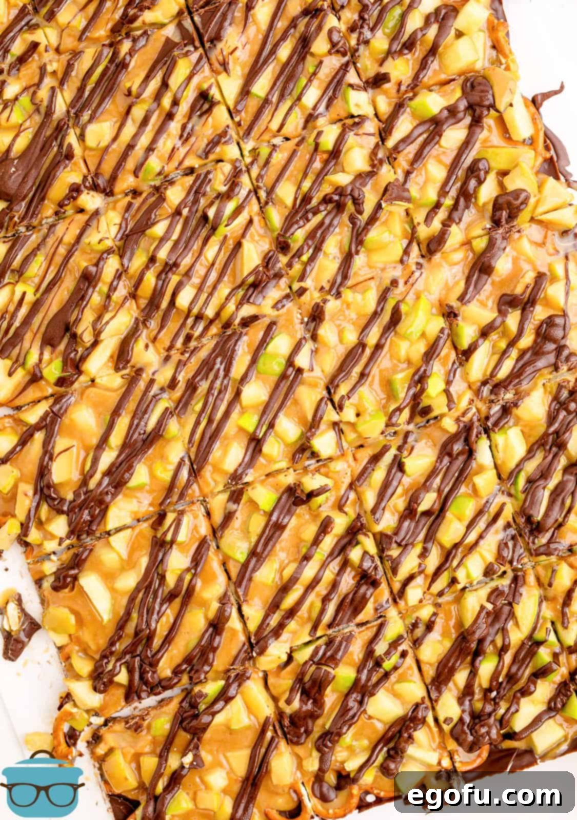 Overhead view of freshly cut Caramel Apple Bark, showcasing its beautiful layers and ready-to-eat pieces.