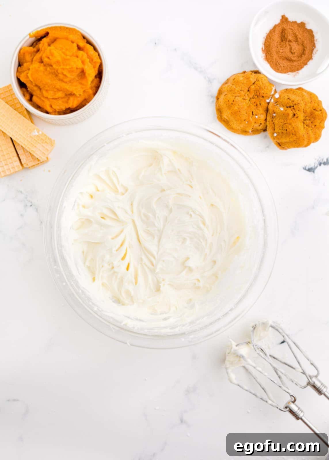 Cream cheese frosting in bowl.