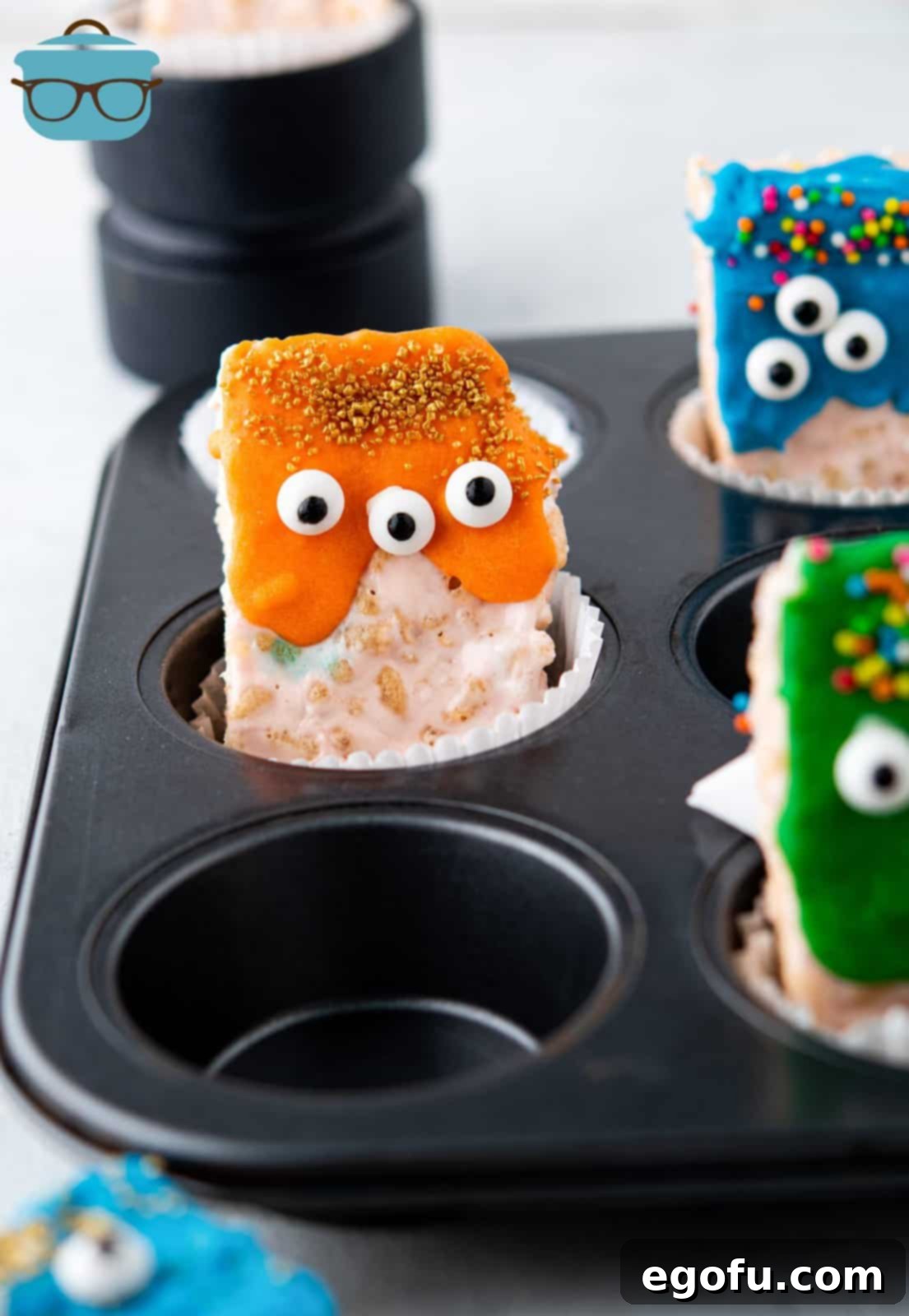 Creepy Crispy Critters 2 Halloween Rice Krispies Monsters in a muffin tin.