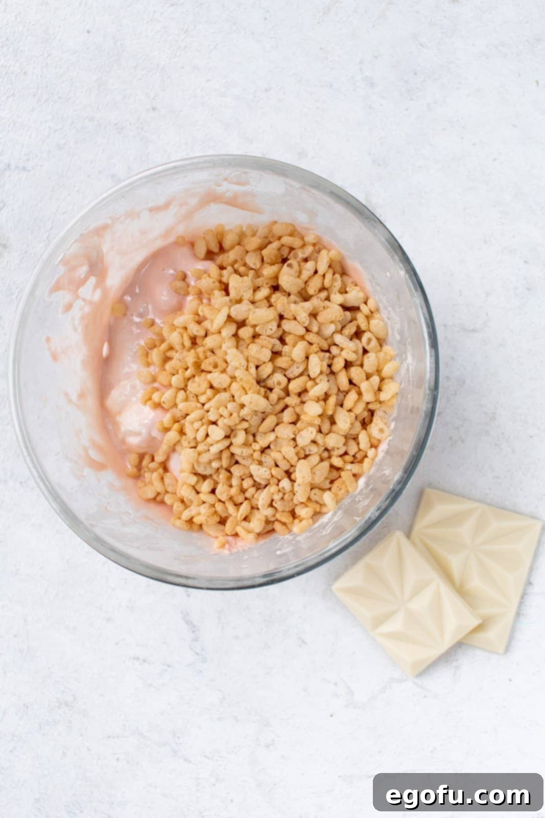 Creepy Crispy Critters 6 Rice Krispies added to marshmallow mixture.