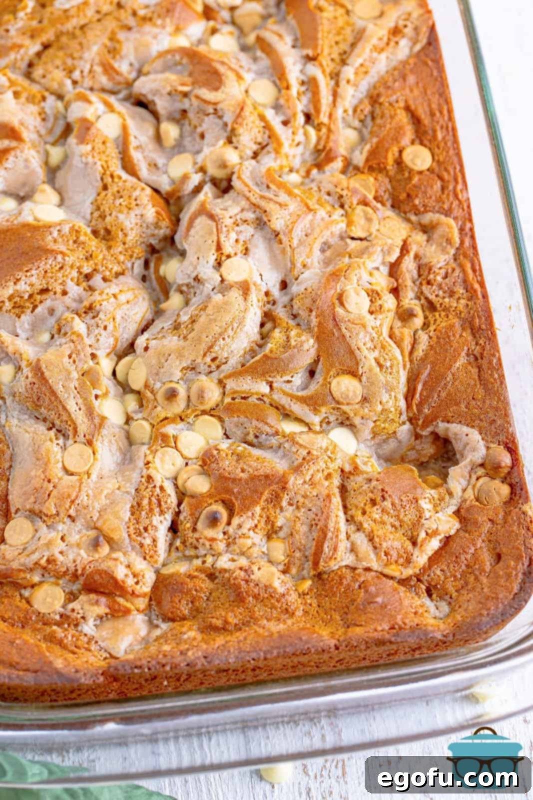 Finished Pumpkin Earthquake Cake, golden brown and crackled, cooling in its baking pan.