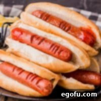 Close up square image of stacked Halloween Hot Dog Fingers.