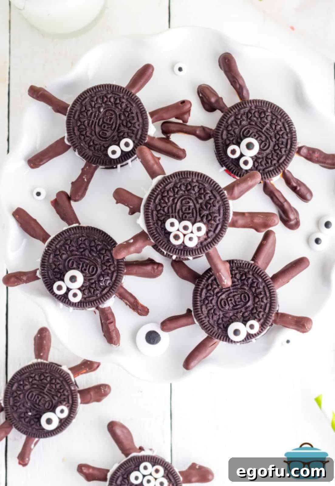 Spooktacular Oreo Spiders 2 Overhead of Halloween Oreo Spiders on white plate showing eyes.