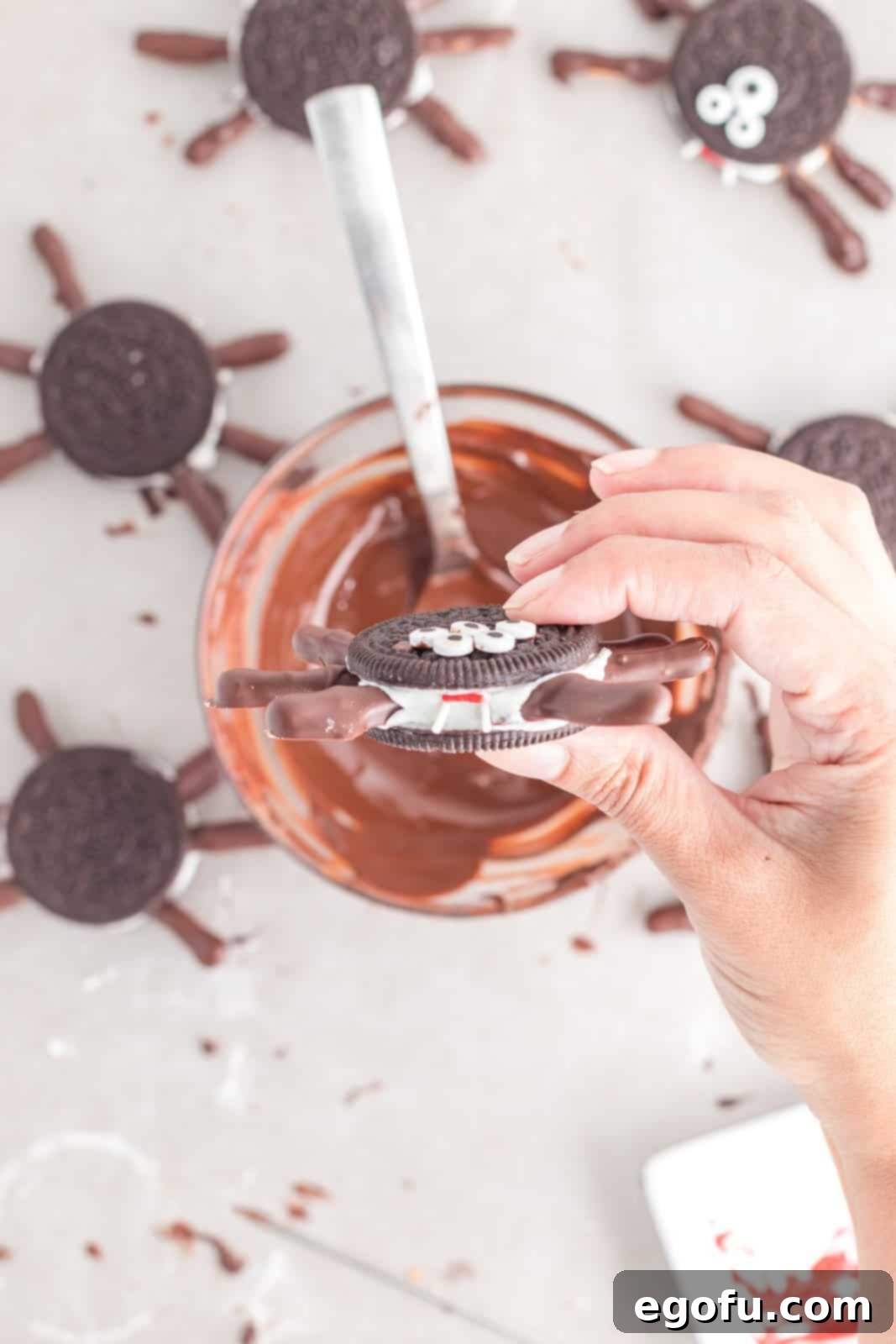 Spooktacular Oreo Spiders 11 Sprinkles added to the Oreo to create mouth and fangs.