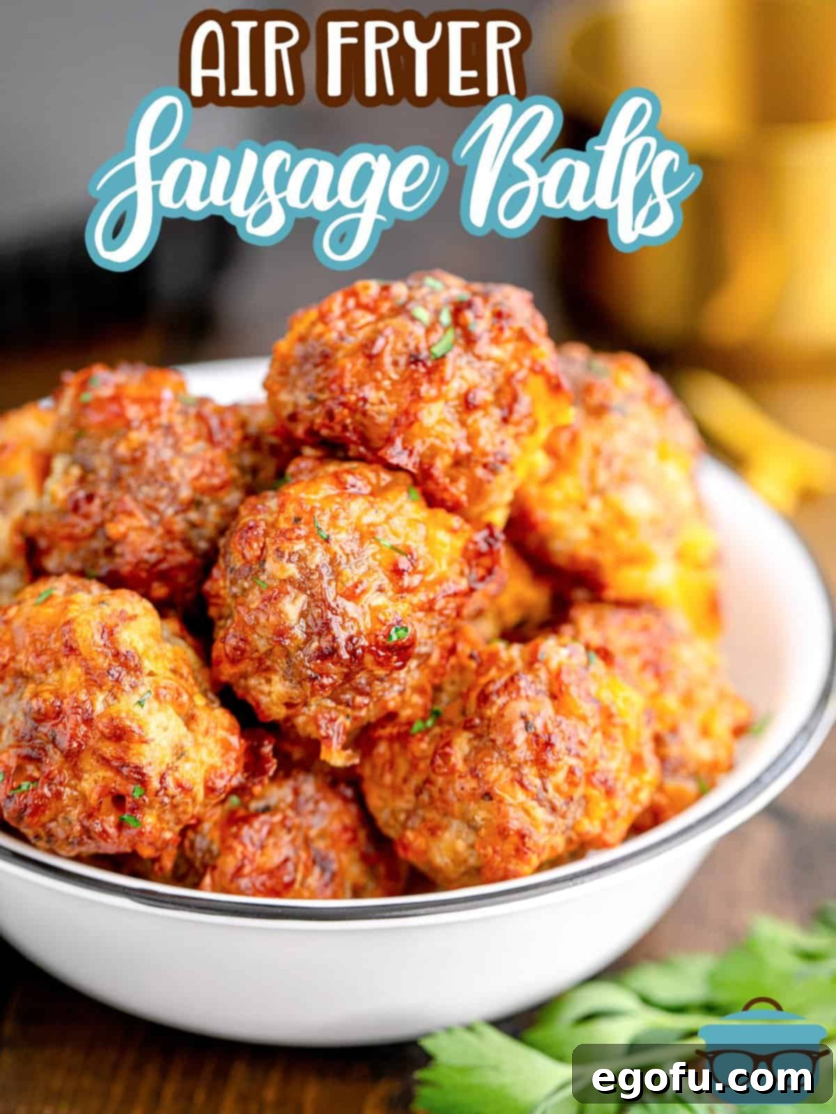 Pinterest image of Air Fryer Sausage Balls stacked in white bowl.