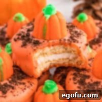 Spiced Pumpkin Patch Cookies 12 Close up square image of bite taken out of one of the Pumpkin Patch Cookies.