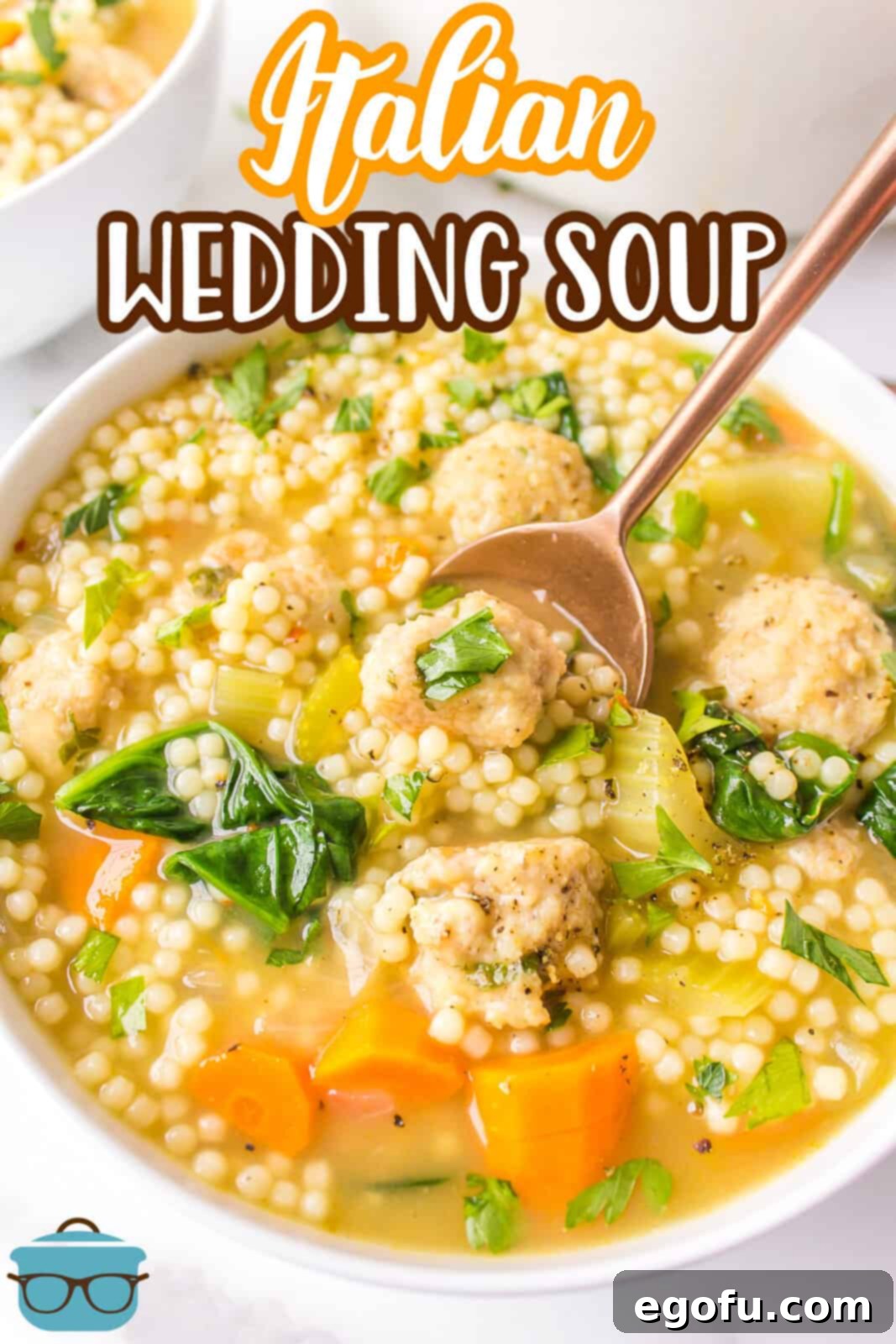 Italian Celebration Soup 3 Close up of Italian Wedding Soup in white bowl with spoon, Pinterest image.