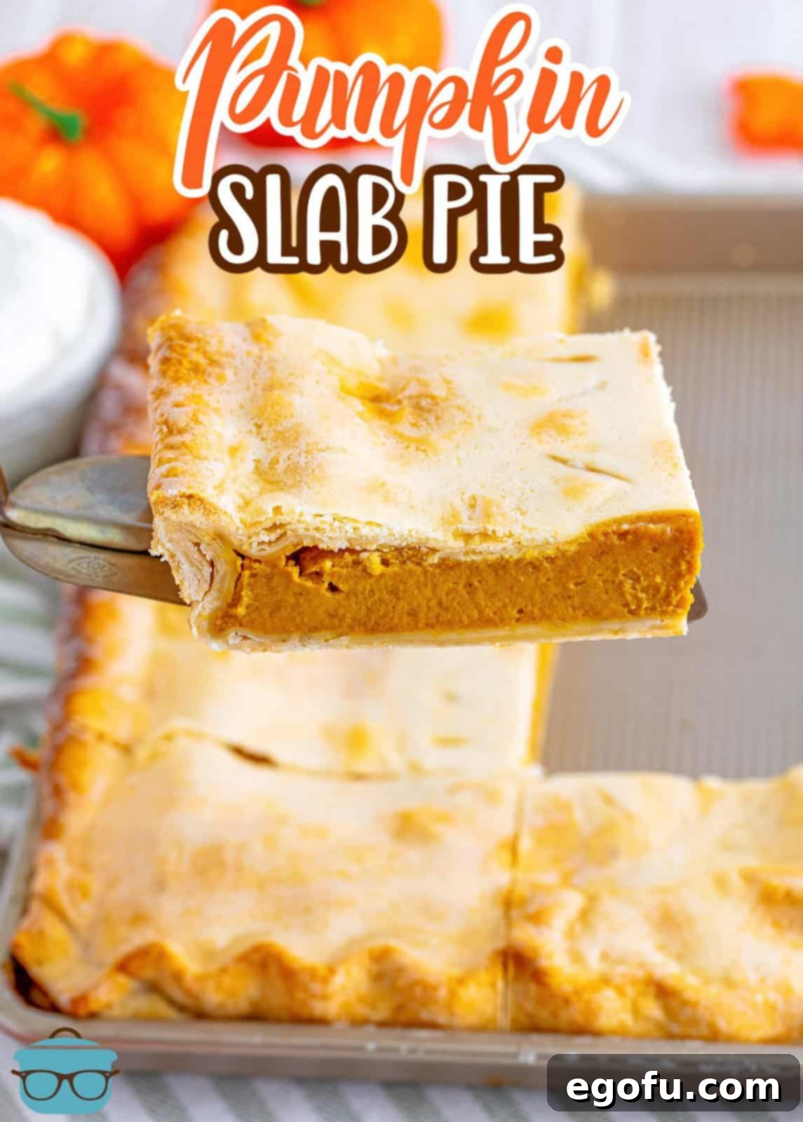 slice of pumpkin slab pie being lifted up with a pie server. 