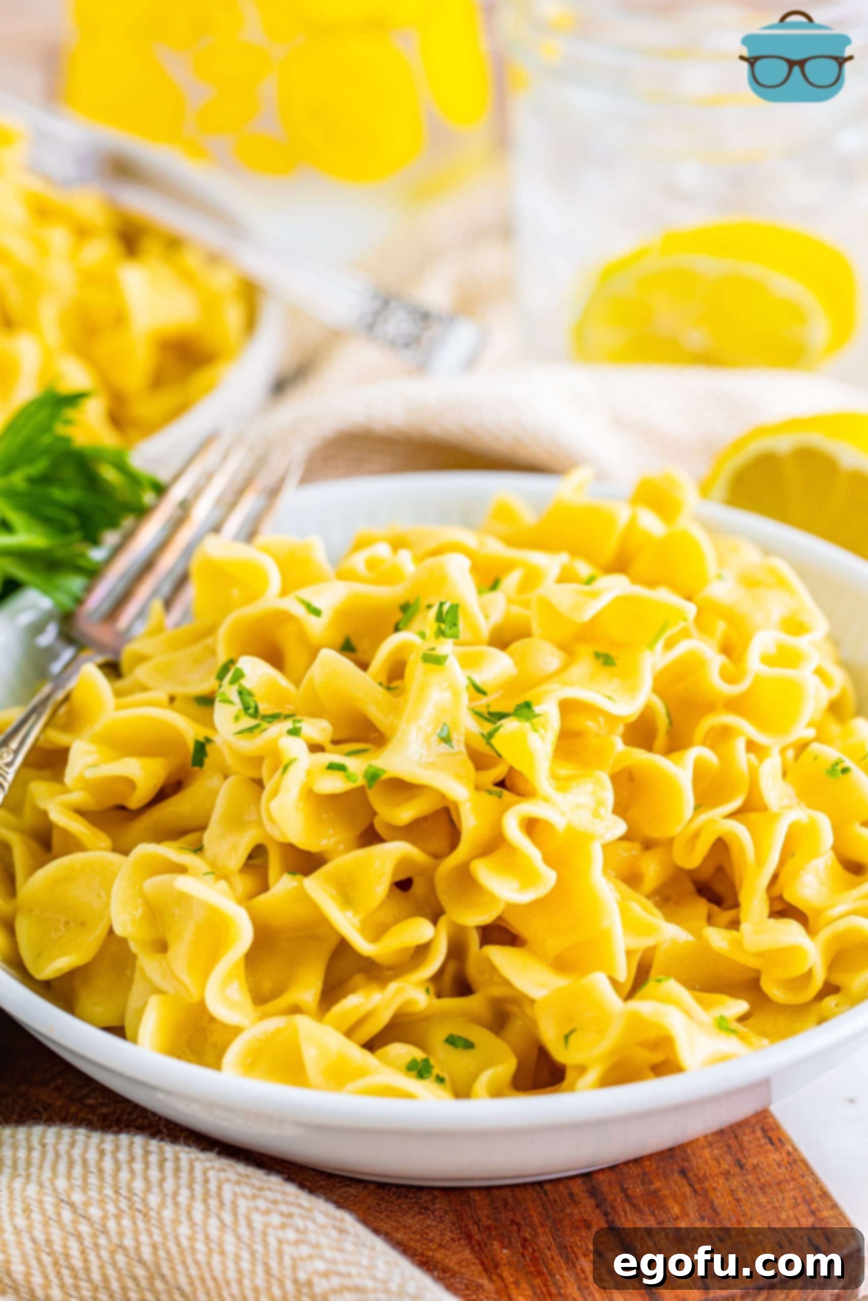 Campus Noodle Comfort 2 A big portion of Cafeteria Noodles on a serving plate, steaming lightly.