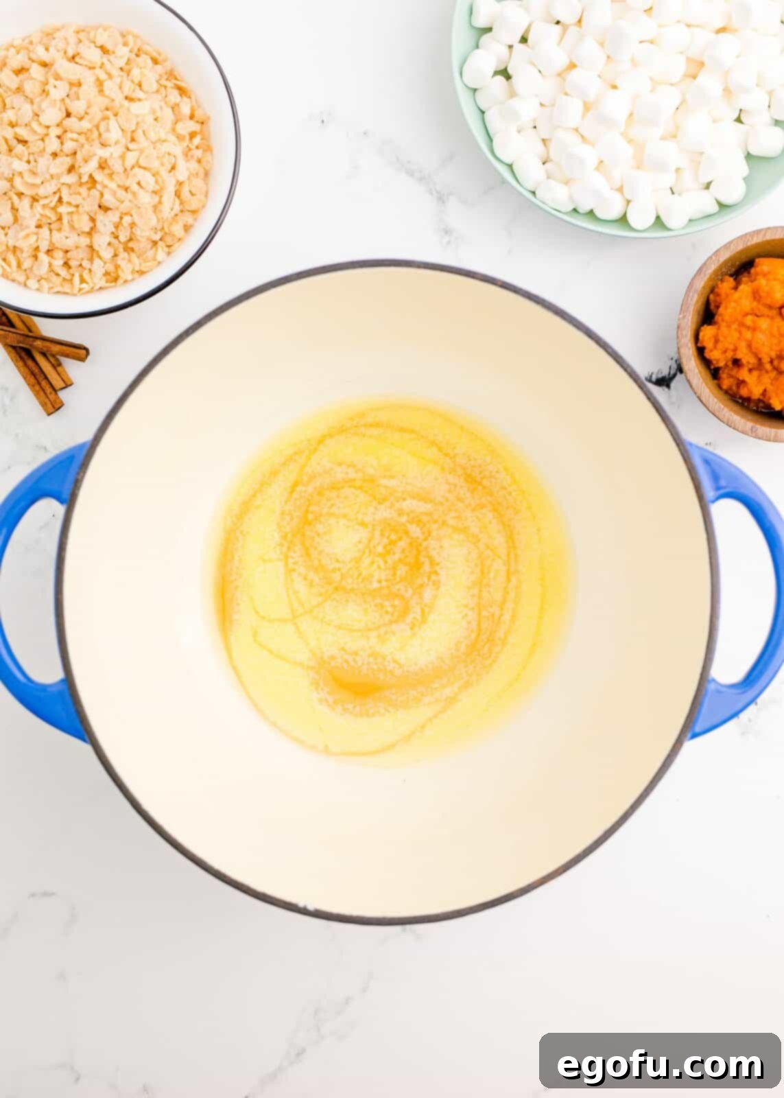 Melted butter with maple syrup in dutch oven.