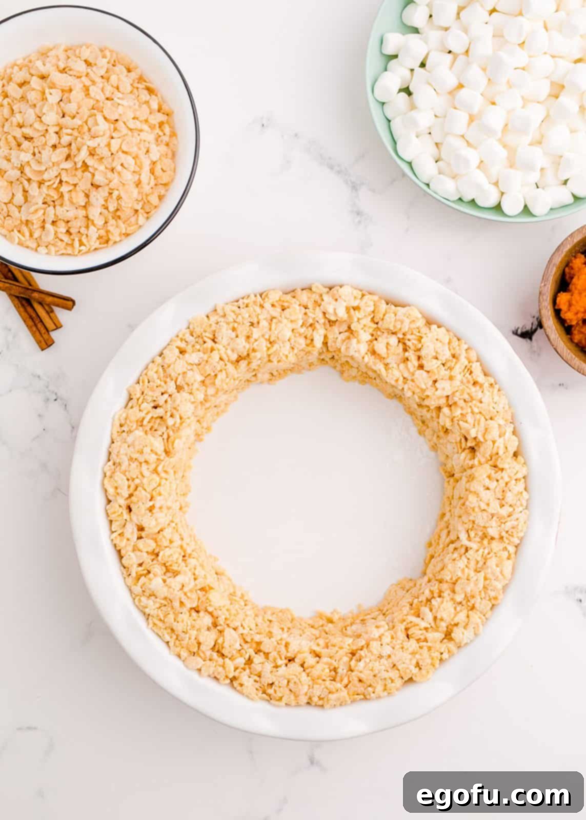 Rice Krispies pressed into the sides of a pie plate.