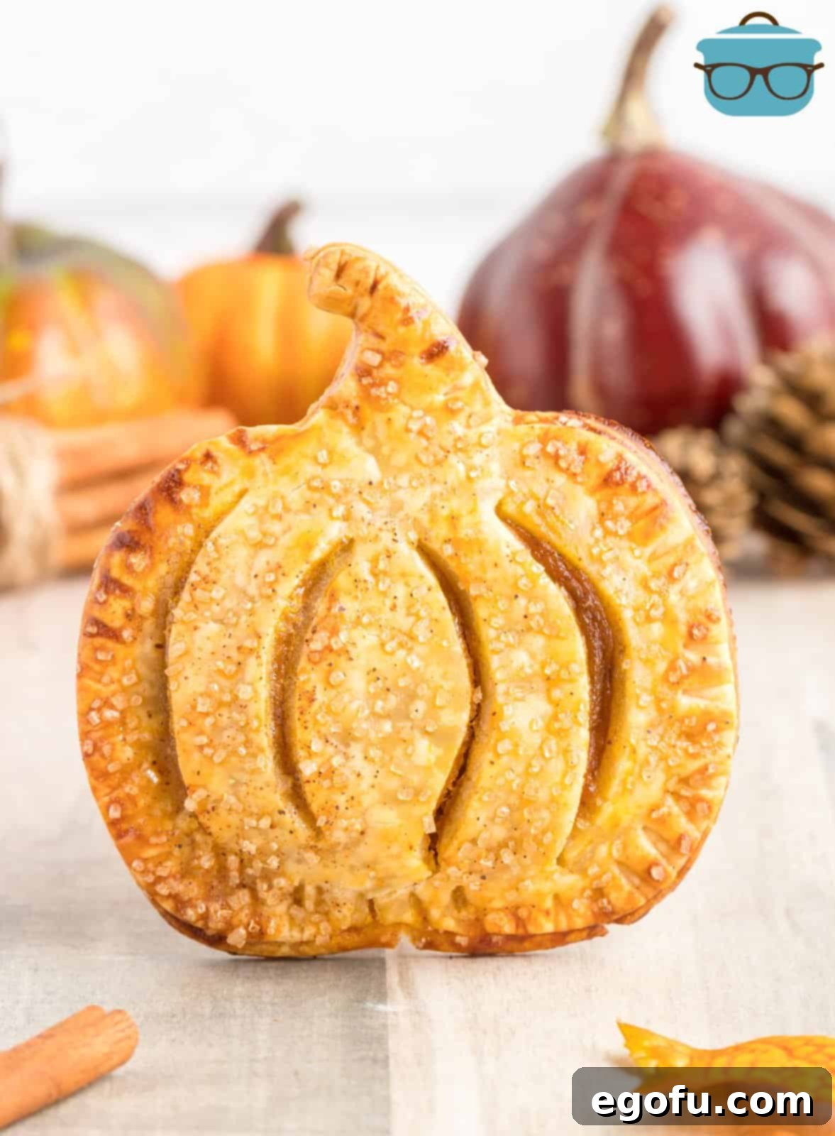 One of the Pumpkin Hand Pies propped up showing the pumpkin shape.