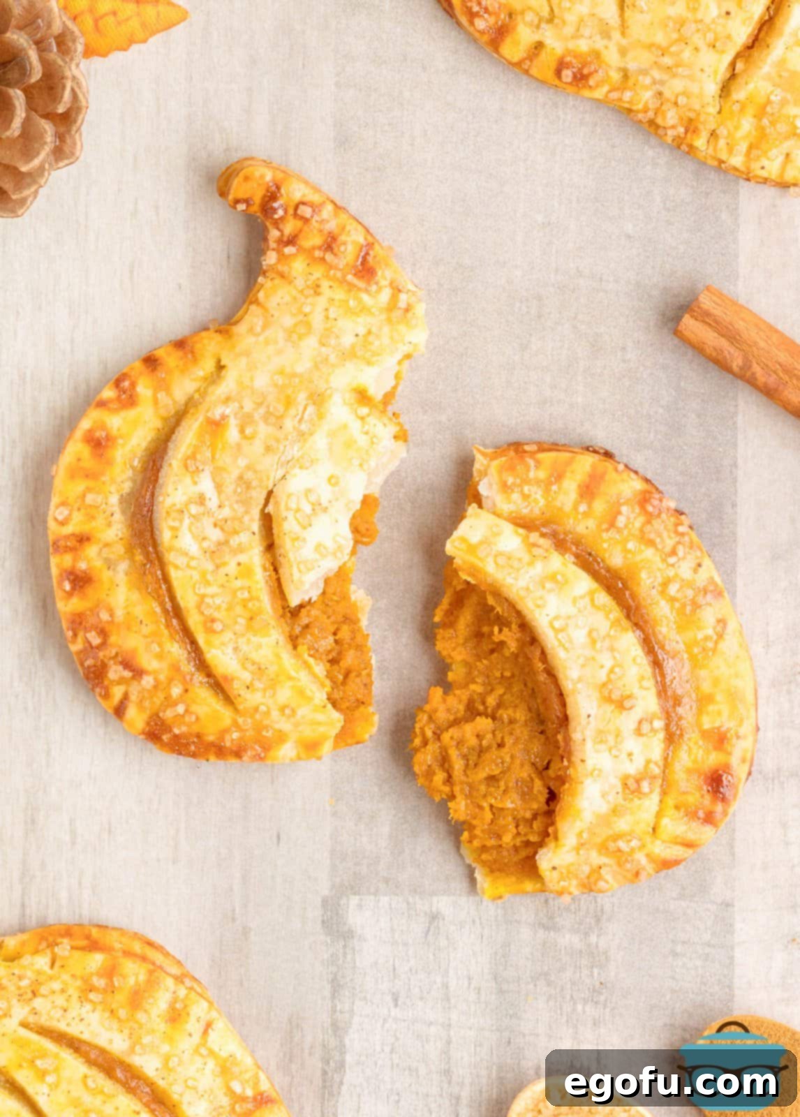 One of the Pumpkin Hand Pies broken open showing filling.