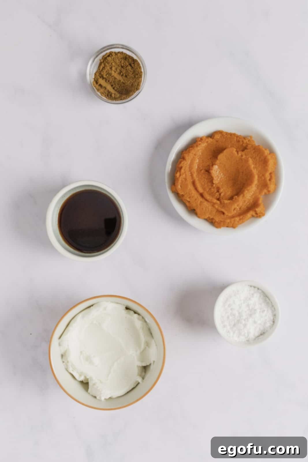 Ingredients needed: pumpkin puree, cream cheese, pumpkin spice, powdered sugar and vanilla extract.