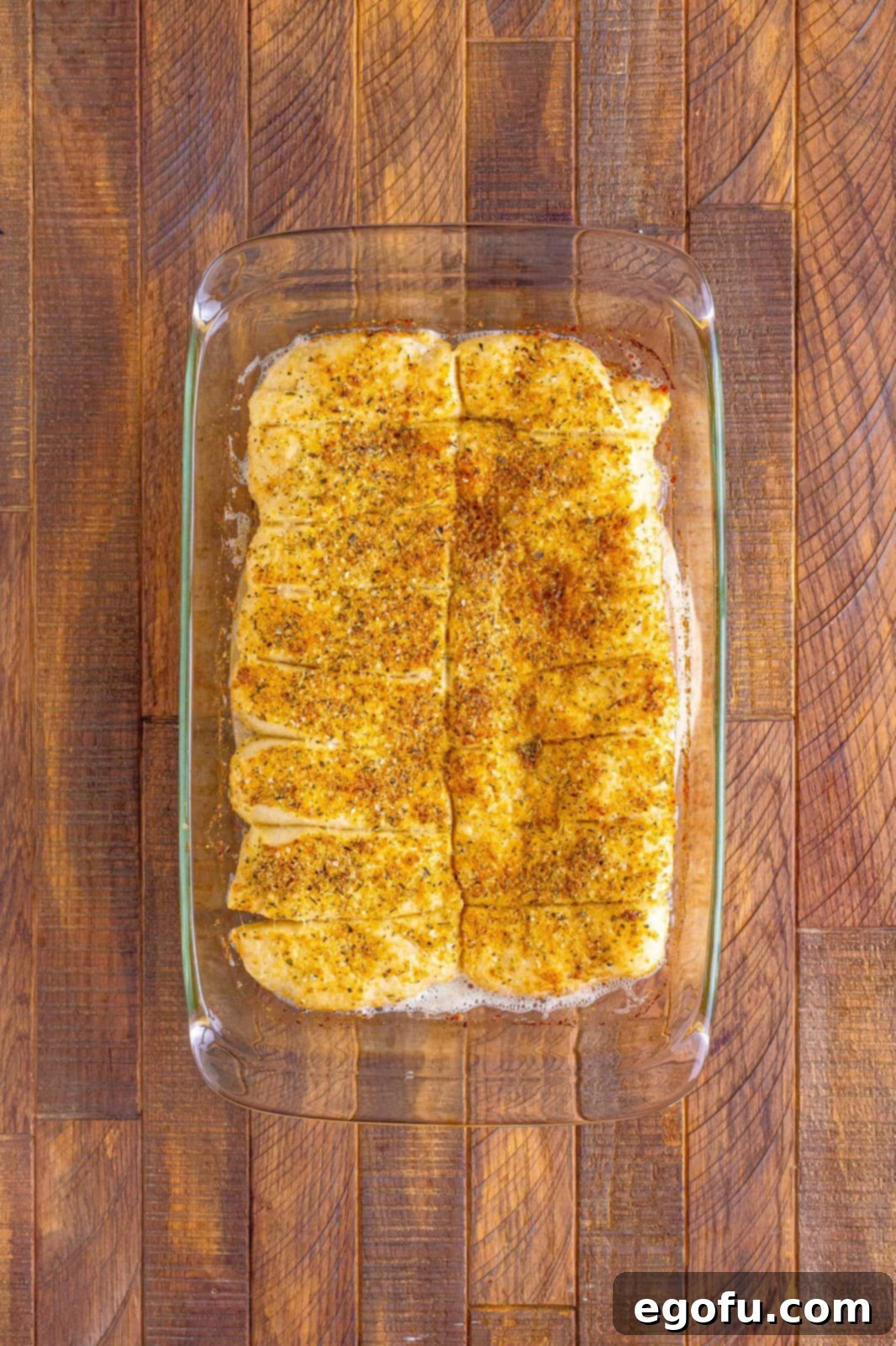 Pizza Hut's Signature Breadsticks 11 Breadsticks finished out of oven in baking pan.