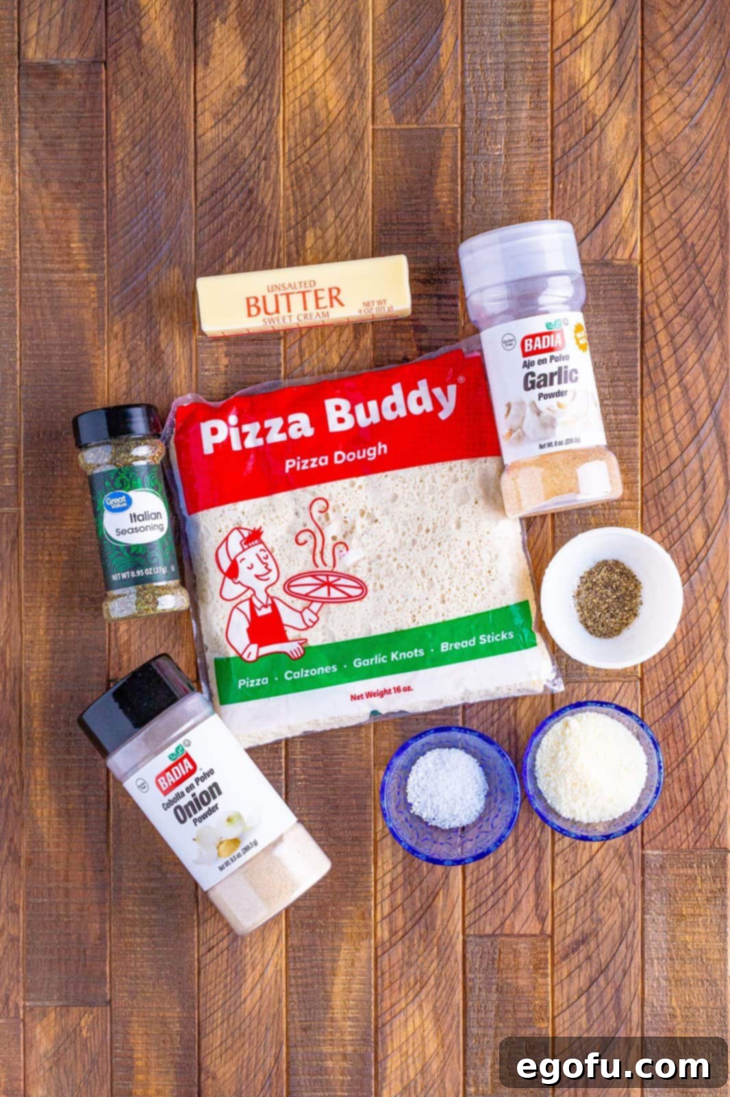Pizza Hut's Signature Breadsticks 4 Ingredients needed: unsalted butter, pizza dough, parmesan cheese, garlic powder, Italian seasoning, onion powder, kosher salt, pepper and Marinara or pizza sauce.