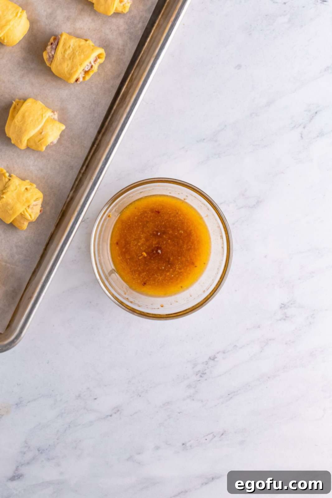 Onion soup mix whisked together with butter in bowl.