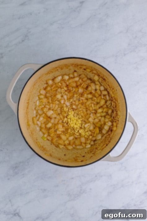 Down South Black Eyed Peas 12 Garlic added to onions in dutch oven.