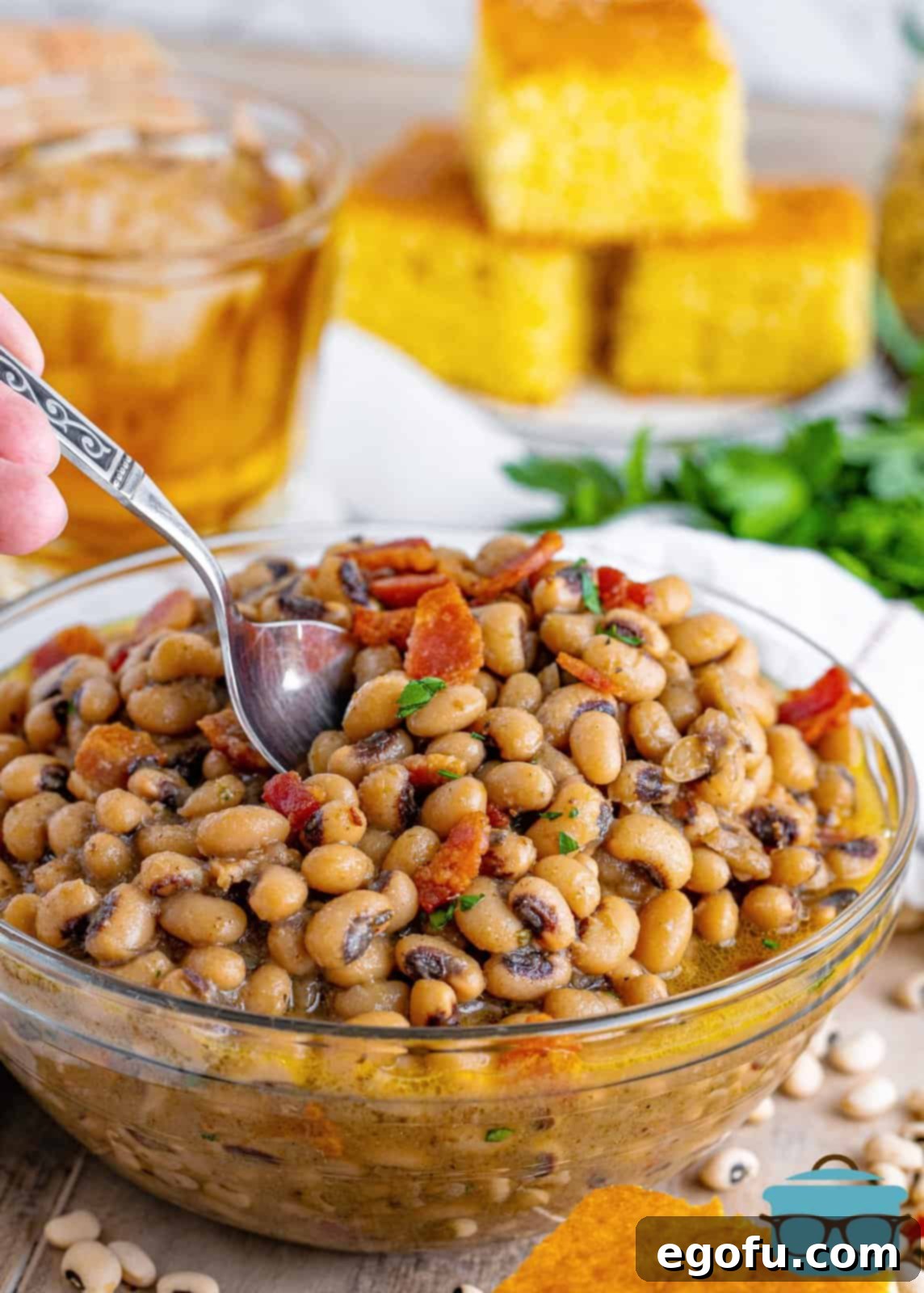 Down South Black Eyed Peas 8 Bowl of Southern Black Eyed Peas with spoon in it.