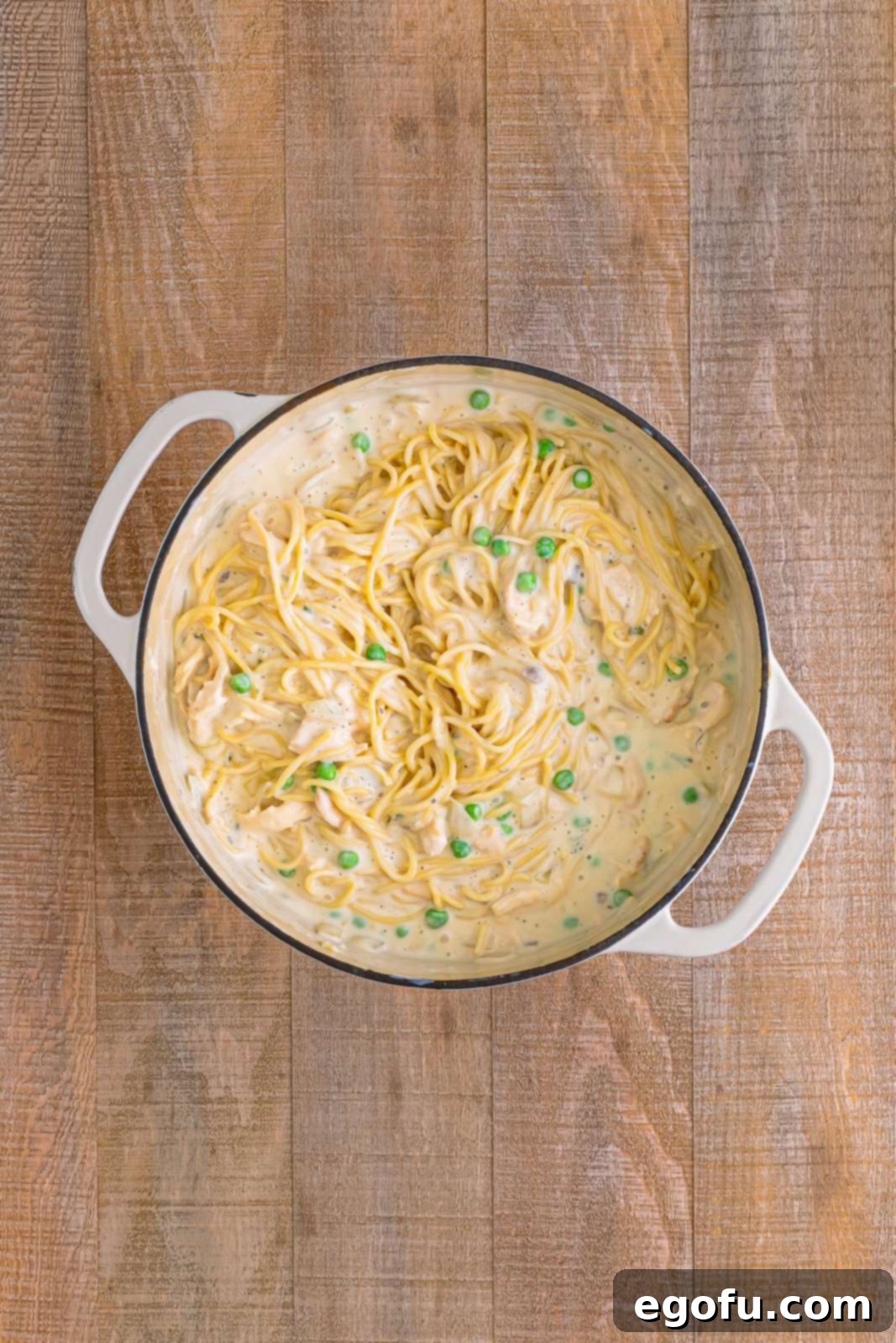 Pasta added to the dutch oven and stirred in.
