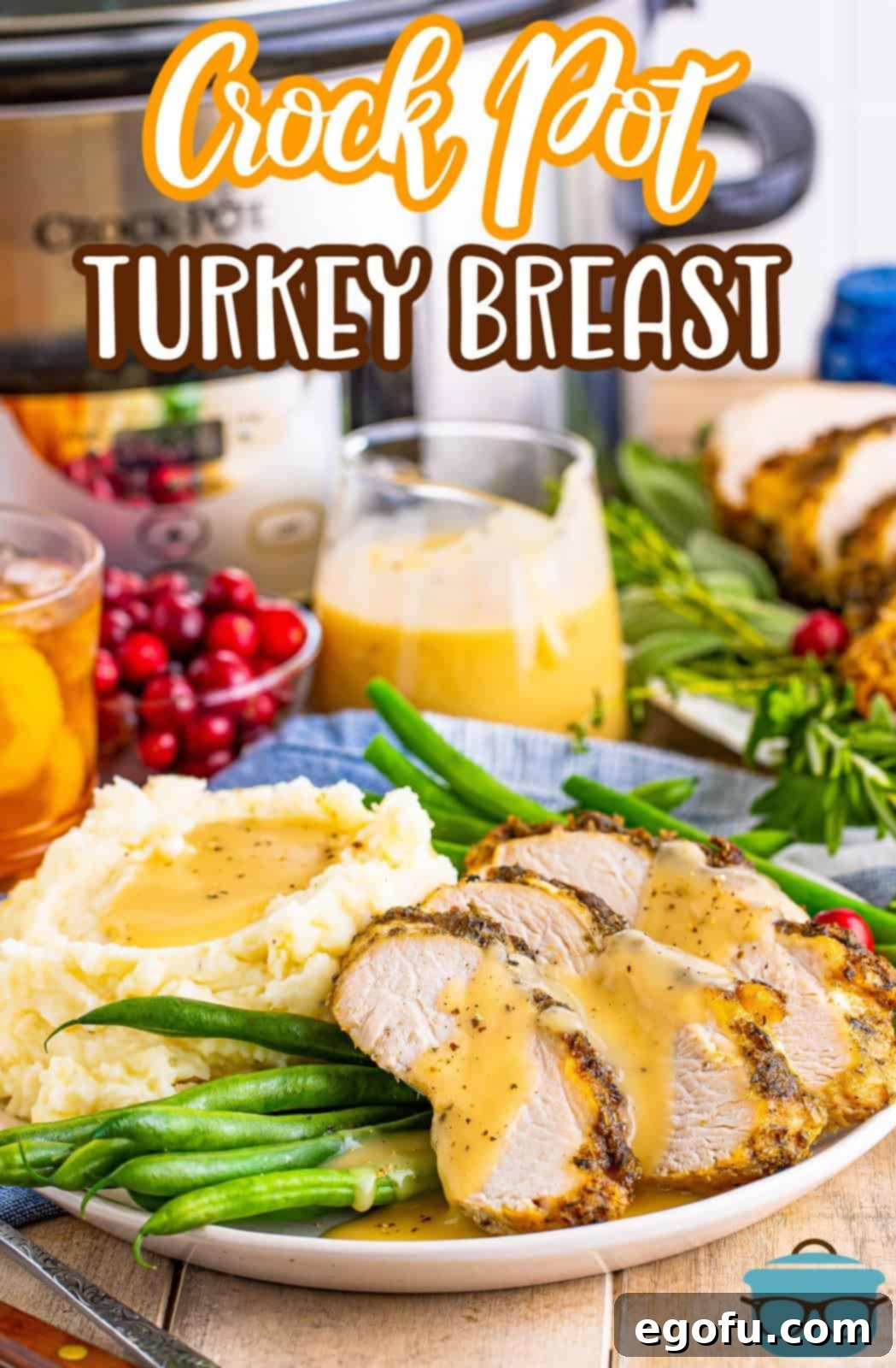 A beautifully presented Pinterest image of perfectly sliced Slow Cooker Turkey Breast, served with traditional side dishes for a complete meal.