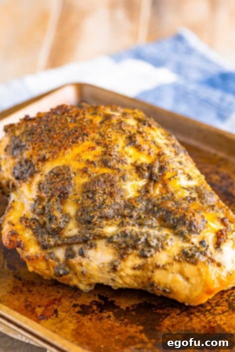 Turkey breast removed to sheet pan.