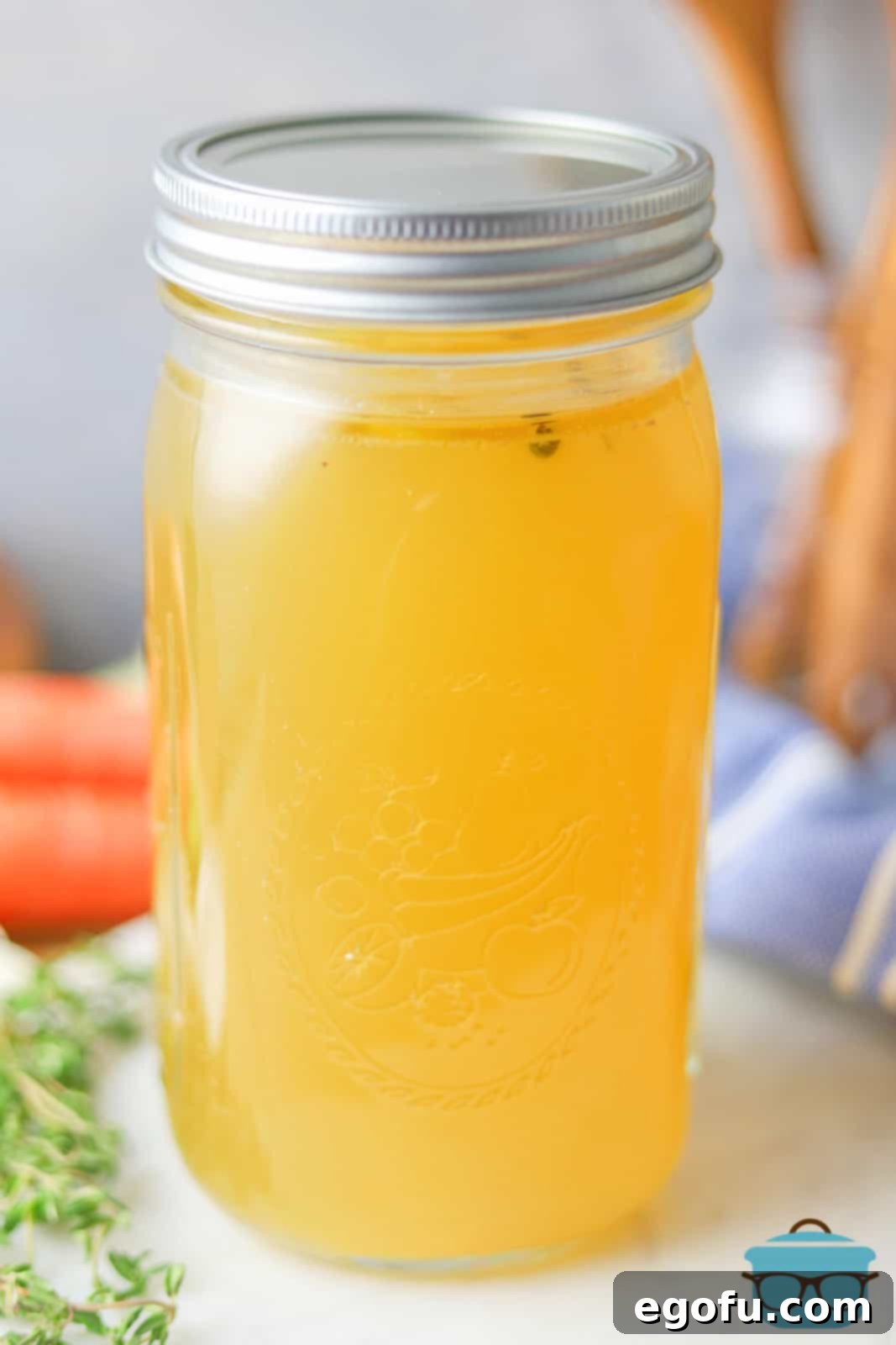 Homemade Chicken Broth in mason jar.