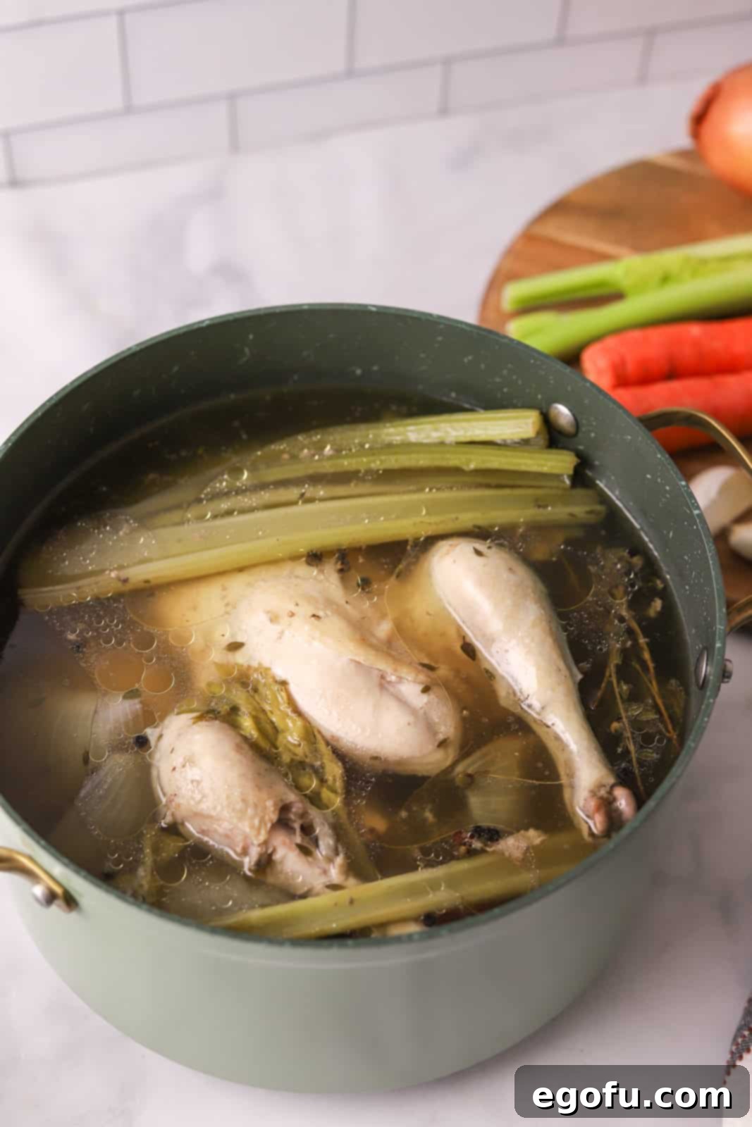 Finished broth in stock pot before straining.