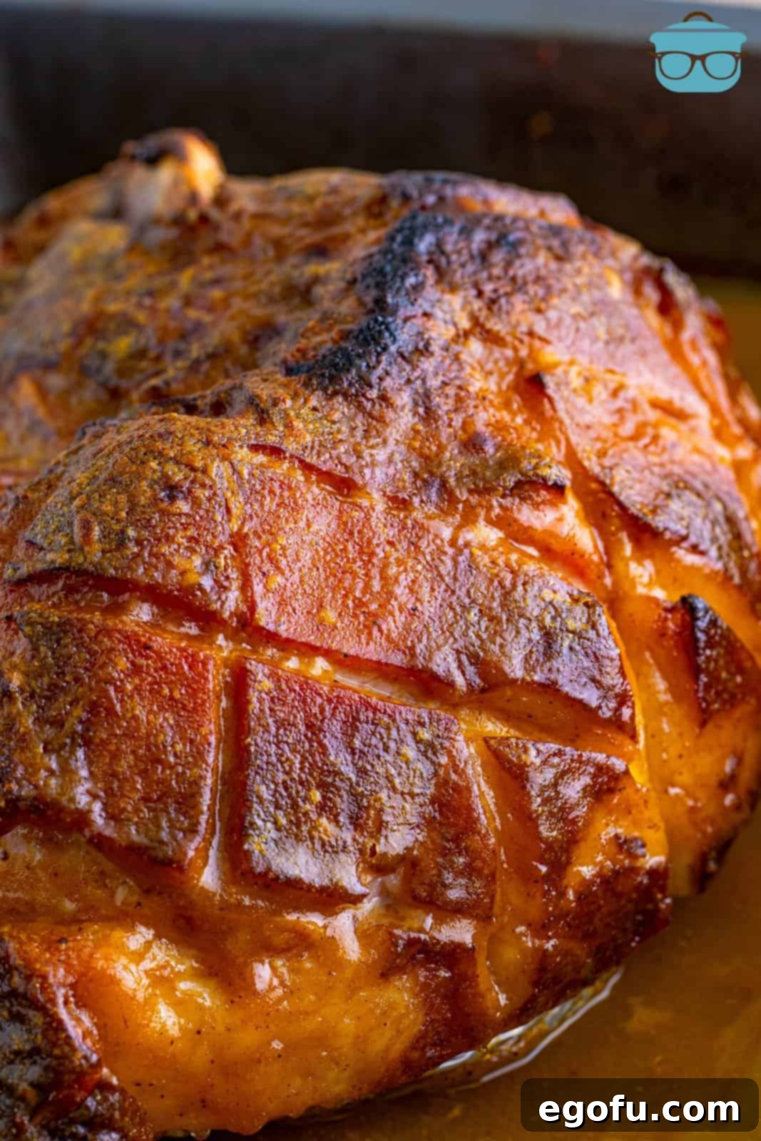 Mahogany Glazed Ham 13 The finished Brown Sugar Glazed Ham in the baking pan, beautifully caramelized and glistening.