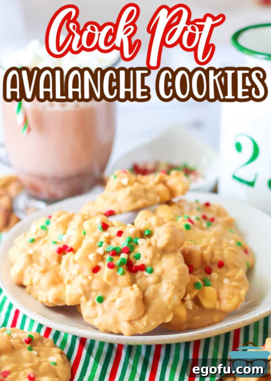 Pinterest image of Crock Pot Avalanche Cookies on white plate with hot chocolate in background, perfect for pinning.