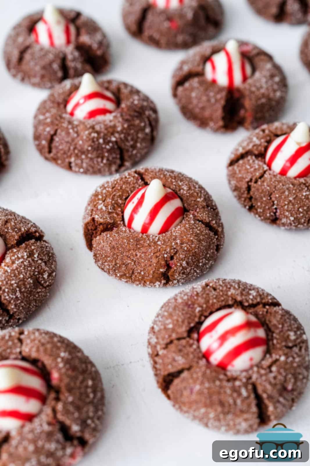 Chocolate Peppermint Kiss Cookies on parchment paper.