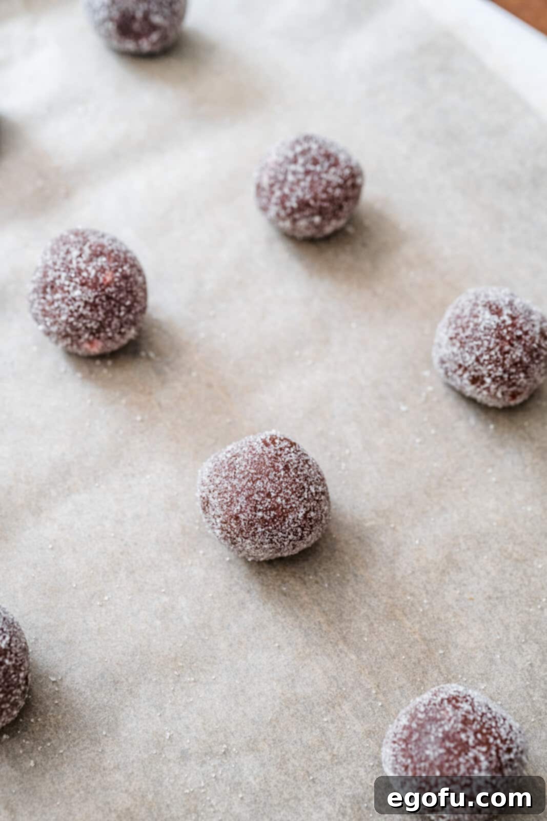 Dough balls placed on prepared baking sheet.