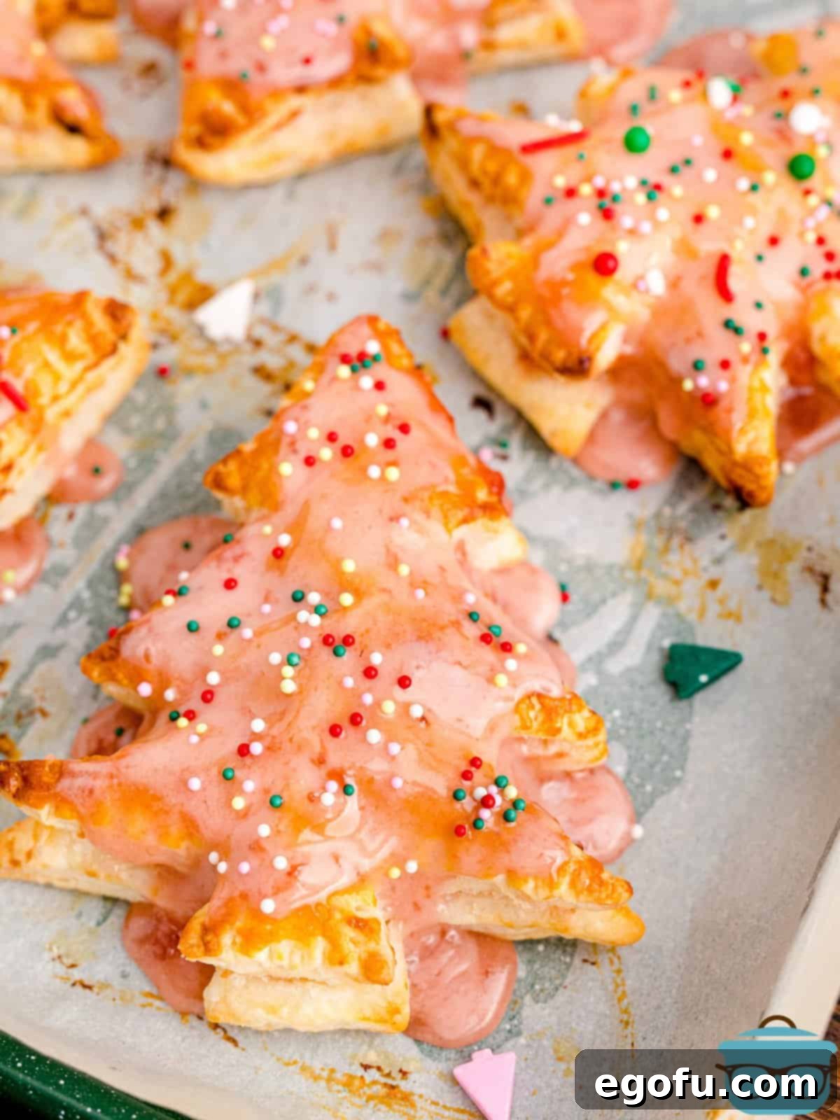 Sparkling Spruce Pop Tarts 11 Close-up of a decorated Christmas Tree Pop Tart, showing the sweet icing and colorful holiday sprinkles.